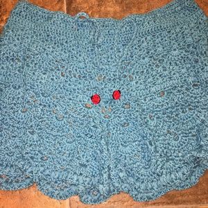 Crocheted crop tops and shorts